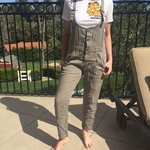 Green linen overalls